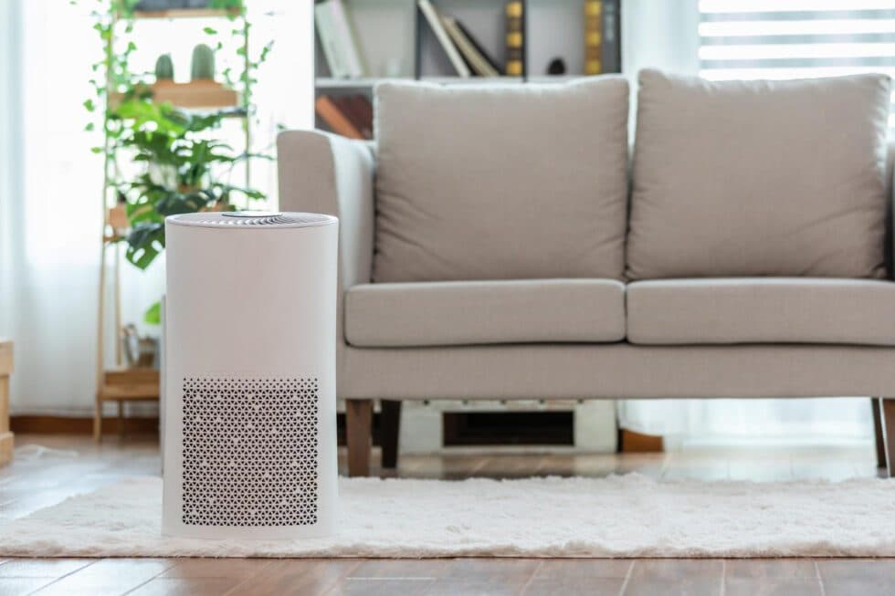 Air purifier standing in a Miami living room as part of an indoor air quality setup